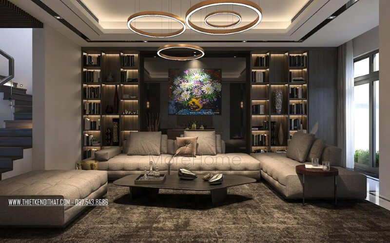 Ấn tượng với bộ sofa lớn thiết kế theo phong cách hiện đại được bọc da nâu cao cấp giữa phòng khách nhà phố. Thiết kế nội thất