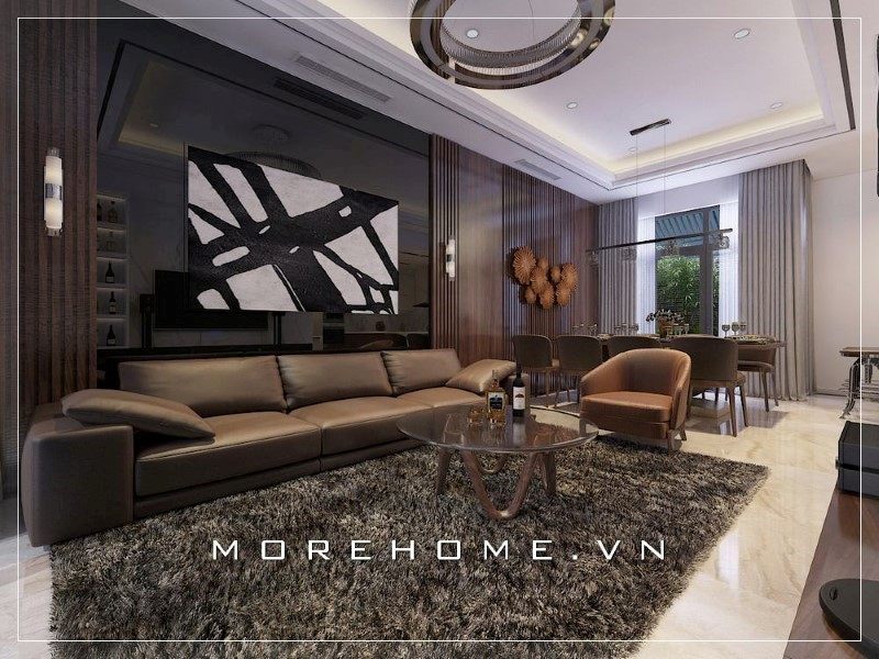 Chiếc bàn trà hình tròn mặt kính với đường nét thiết kế đơn giản nhưng vô cùng ấn tượng.