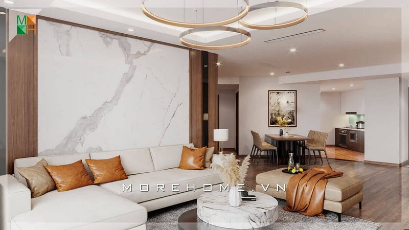.
Phòng khách là nơi đầu tiên gia chủ thể hiện gu thẩm mỹ tinh tế khi bước vào một ngôi nhà. Bộ sofa chữ L bằng gỗ tự nhiên bọc nỉ kết hợp với đá ốp tường vân mây cao cấp sẽ giúp cho phòng khách của gia chủ thêm phần đẳng cấp và sang trọng.